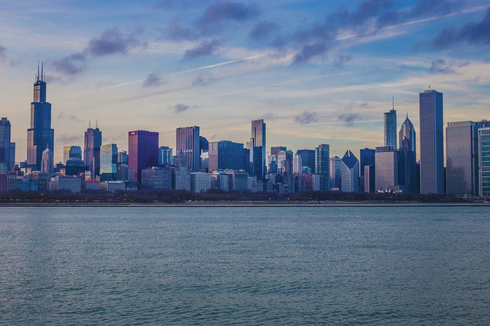 The Chicago skyline across Lake Michigan at dusk